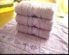 Solid jacquard border bath towel