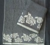 Terry towel with jacquard border & strass