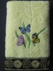 Velour jacquard towel with border and embroidery