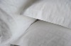 White satin farbic hotel pillow case