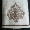 cotton solid face towel with golden embroidery