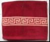 red solide colour bath towel with border