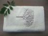 solid bath towel with tree design embroidery