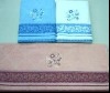 solid jacquard bath towel with embroidery and border