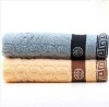 100% cotton jacquard solid face towel