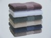 100% cotton solid dyed terry bath towel with satin border
