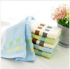 100% cotton solid face towel with border