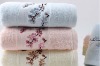 100% solid cotton bath towel with embroiderey border