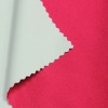 2-tone interlock fabric made of 84% poly and 16% spandex