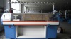 Computerized flat knitting machine(double system)