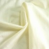 Cream-coloured  plain dyed weft  knitted lycra polyamide spandex fabric