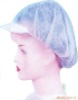 Disposable non-woven bouffant cap with peak