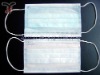 Disposable nonwoven face mask