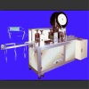 Horizontal tie tape mask machine