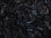 Leather and Suede Rough Cut Shaggy Rug in Black close up