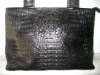 Manufacturer of Genuine Exotic Skin Leather products: Alligator/ Crocodile leather handbags, bags, wallets, Stingray belts, Sna