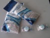 Nonwoven coin tissue