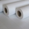 Nonwoven fusible interlining