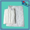 Nonwoven oil spill absorbent material