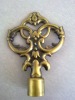 Plated curtain pole cap in antique brass
