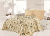 Printed sateen duvet with plain dyed pillows and sheets