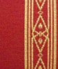 Red broadloom wool carpet