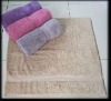 Solid bath towel with border