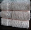 Solid bath towel with border