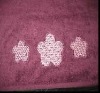 Solid bath towel with border