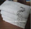 Solid bath towel with embroidery and lace