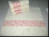 Solid jacquard bath towel with border