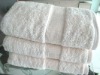 Solid jacquard bath towel with border