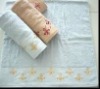 Solid jacquard bath towel with embroidery