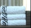 Solid jacquard border bath towel