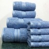 Solid stain-border bath towel