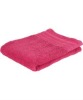 Solid stain-border bath towel