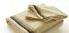 Solid stain-border bath towel