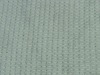 Stitch bond nonwoven fabric with flame retardant