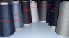 Stocked recycled polyester spun yarn
