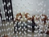 String curtain with fuzzy balls