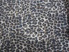 The polyester composite ground wool fabrics with leopard grain design