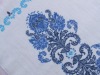 White cotton tea towel with blue flowers