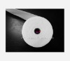 apertured white nonwoven towel roll