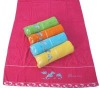 beach towel with jacquard design and embroidery