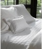 comforterable white  bedspread