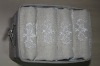 cotton terry face towel with embroidery in a basket