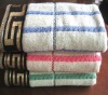 dobby stripe bath towel with jacquard on the border