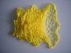 dyed mesh yarn with pompom in knitting pattern