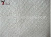 embossed oil absorbent material for wipe