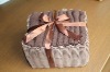 gift cotton towel in willow basket